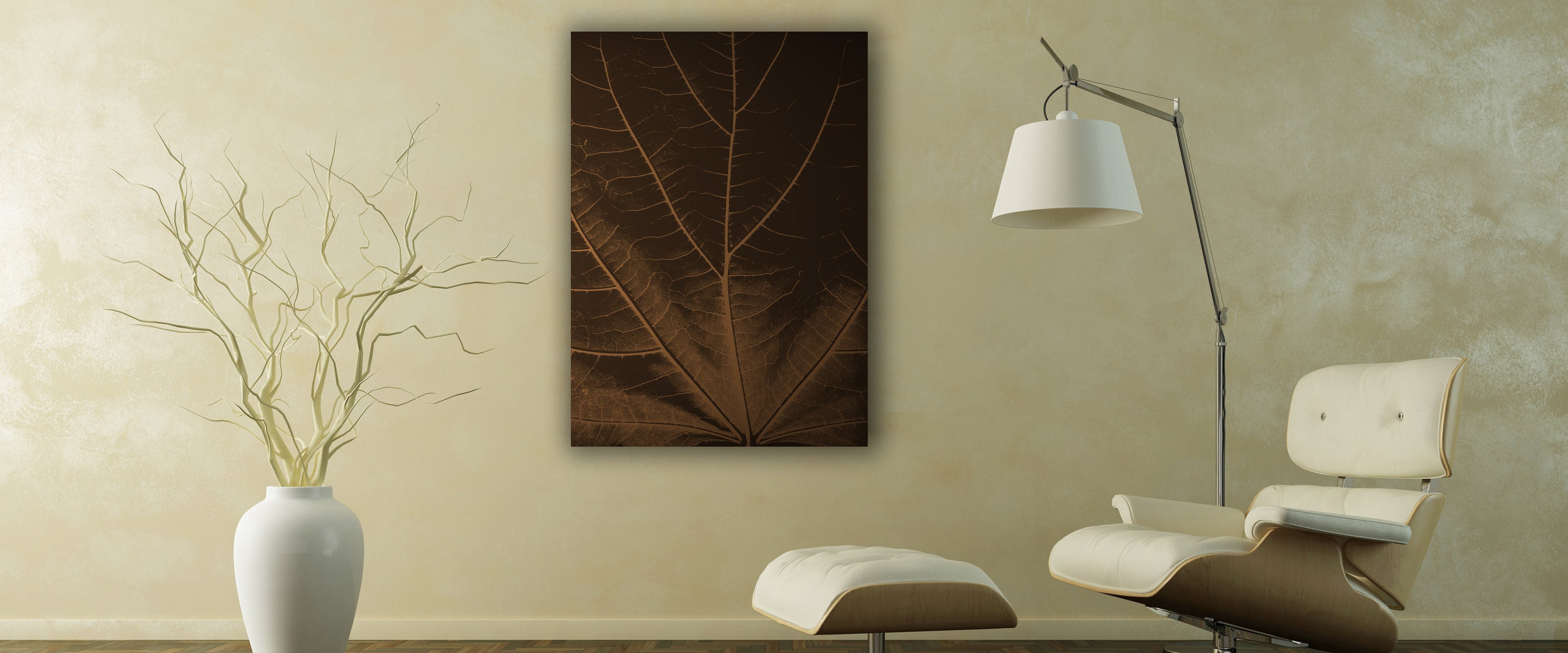 Tilia canvas print featuring a brown leaf with detailed veins, hanging above armchair in modern living room.